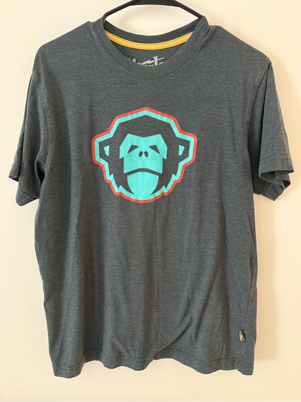 Howler Brothers Charcoal Tee with Teal & Red Monkey Logo